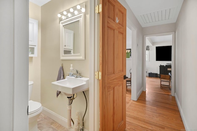18 Nye St, Vernon, CT 06066 - bathroom with toilet and wood finished floors