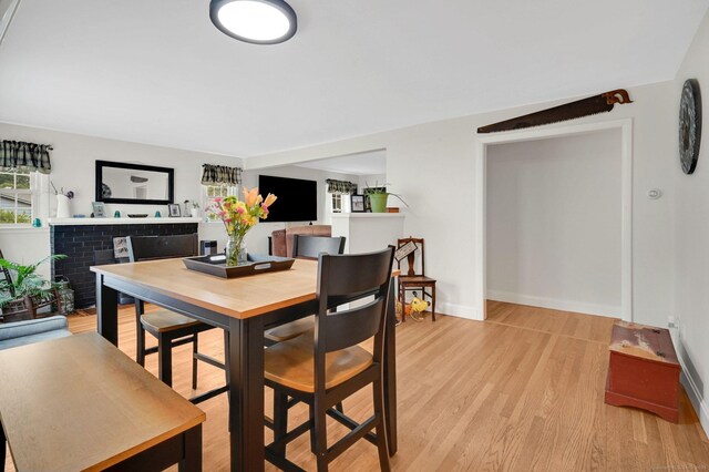 18 Nye St, Vernon, CT 06066 - dining space with light wood-style flooring and baseboards