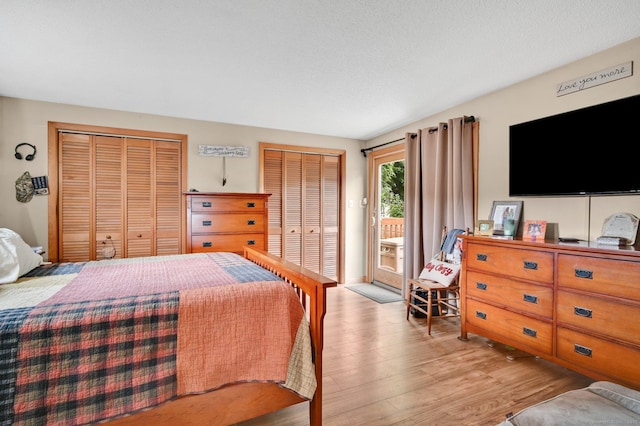 18 Nye St, Vernon, CT 06066 - bedroom with access to exterior, light wood-style flooring, and multiple closets