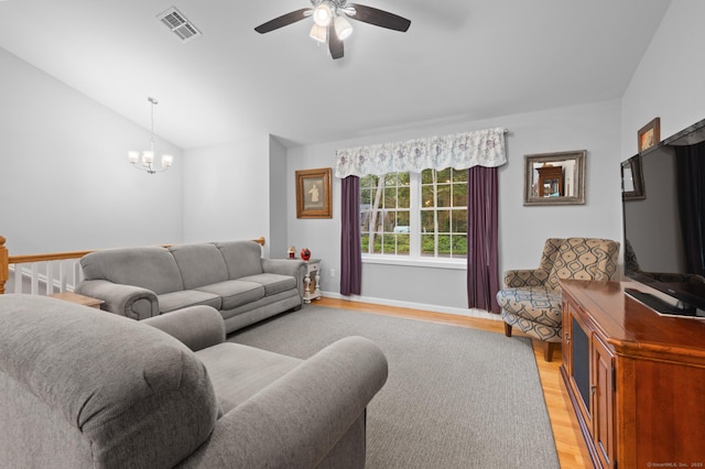 233 W Rd, East Haddam, CT 06420 - living area featuring ceiling fan, light wood-style flooring, vaulted ceiling, and a chandelier