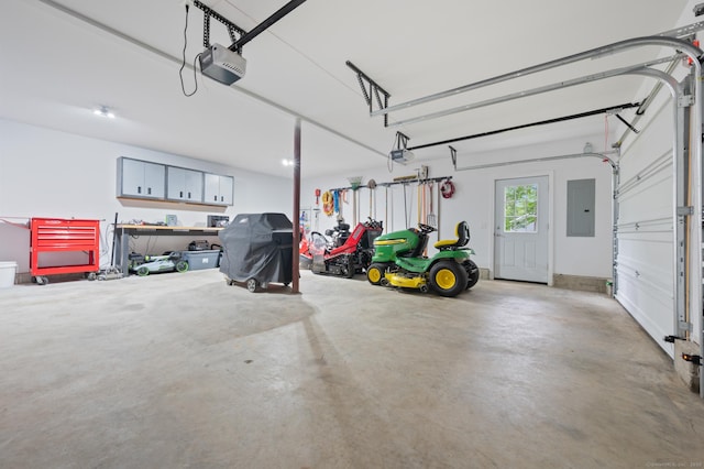 233 W Rd, East Haddam, CT 06420 - garage with electric panel and a garage door opener