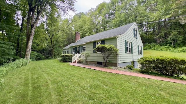 147 Smith Hill Rd, Winchester, CT 06098 - view of front facade with a chimney and a front lawn