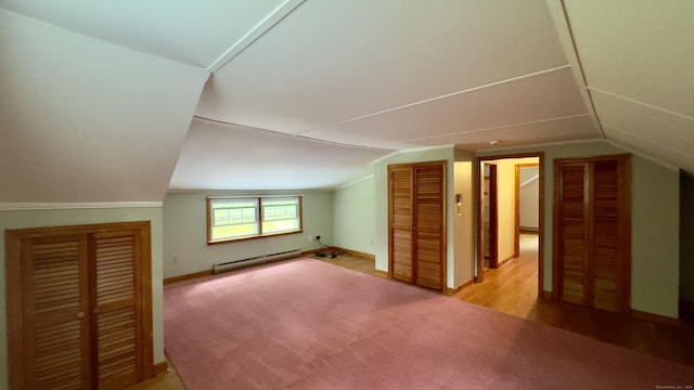 147 Smith Hill Rd, Winchester, CT 06098 - additional living space with a baseboard radiator, light colored carpet, and vaulted ceiling