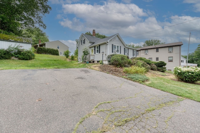 6 Rau Street Ext, Vernon, CT 06066 - view of front of property with a chimney and a front lawn