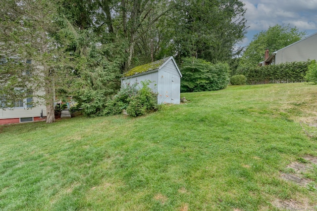6 Rau Street Ext, Vernon, CT 06066 - view of green lawn with a storage unit