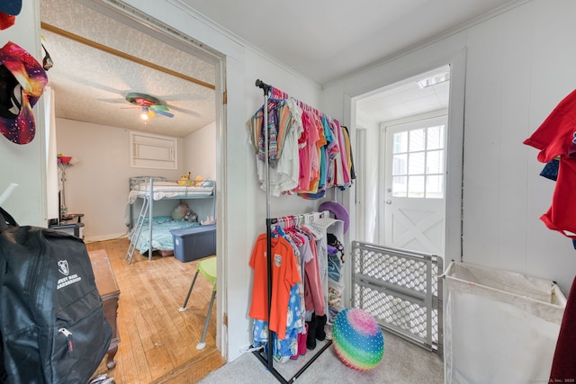 6 Rau Street Ext, Vernon, CT 06066 - laundry area featuring wood finished floors, a ceiling fan, and crown molding