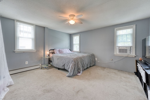 6 Rau Street Ext, Vernon, CT 06066 - carpeted bedroom with baseboard heating, cooling unit, multiple windows, a ceiling fan, and a textured ceiling