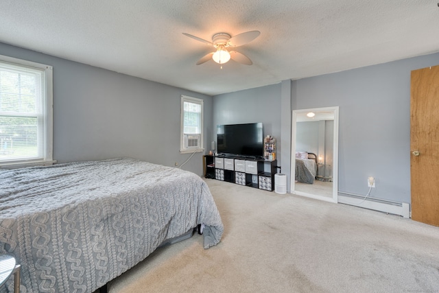 6 Rau Street Ext, Vernon, CT 06066 - carpeted bedroom featuring baseboard heating, a textured ceiling, and a ceiling fan