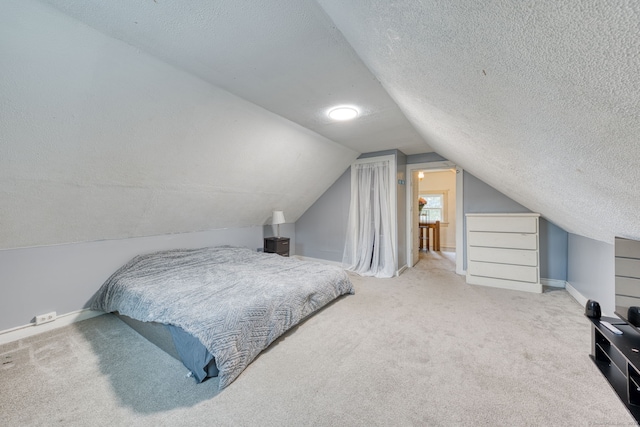 6 Rau Street Ext, Vernon, CT 06066 - carpeted bedroom with a textured ceiling and vaulted ceiling