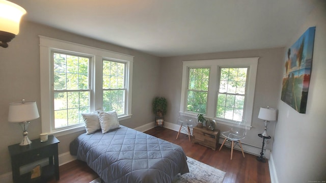 62 Park St, Stafford, CT 06076 - bedroom with multiple windows and wood finished floors