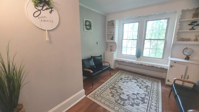 62 Park St, Stafford, CT 06076 - sitting room with dark wood-style floors and ornamental molding
