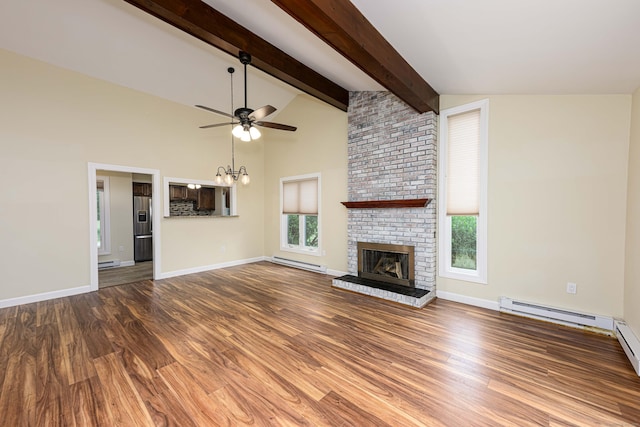 17 Pilgrim Hbr Unit A, Wallingford, CT 06492 - unfurnished living room with a baseboard heating unit, wood finished floors, a fireplace, and a chandelier