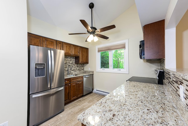 17 Pilgrim Hbr Unit A, Wallingford, CT 06492 - kitchen featuring appliances with stainless steel finishes, baseboard heating, tasteful backsplash, a ceiling fan, and lofted ceiling