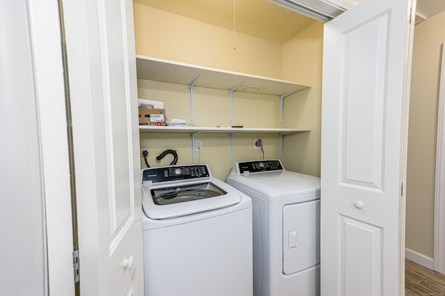 17 Pilgrim Hbr Unit A, Wallingford, CT 06492 - laundry area featuring wood finished floors and separate washer and dryer