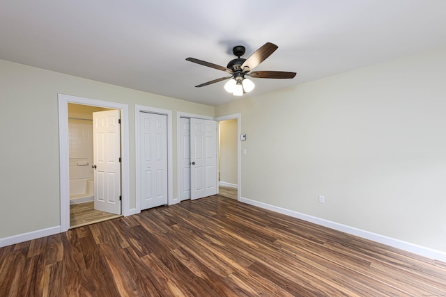 17 Pilgrim Hbr Unit A, Wallingford, CT 06492 - unfurnished bedroom featuring wood finished floors, multiple closets, ensuite bath, and a ceiling fan