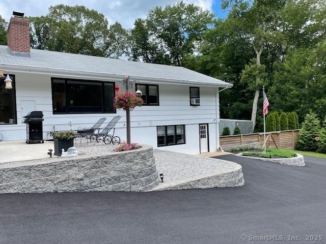 48 Mulberry Rd, Woodbridge, CT 06525 - view of front of property featuring a chimney