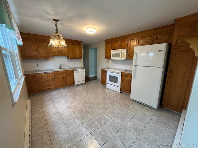 117 Lyons Rd, Bristol, CT 06010 - kitchen featuring light tile patterned floors, white appliances, brown cabinets, and light countertops