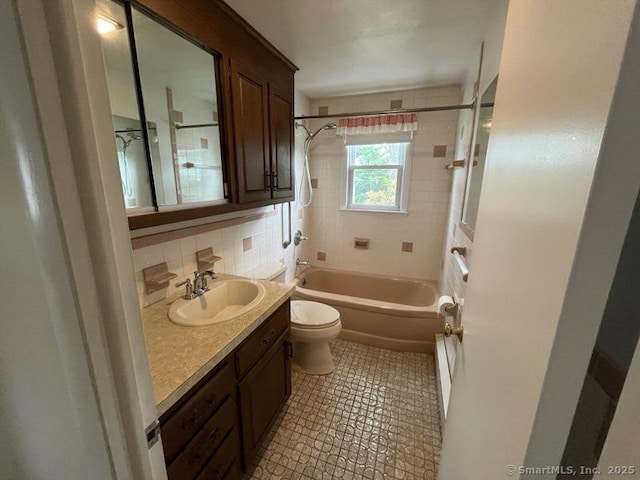 117 Lyons Rd, Bristol, CT 06010 - full bath with vanity,  shower combination, tile patterned flooring, and decorative backsplash