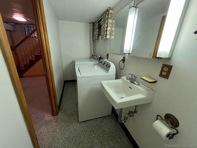117 Lyons Rd, Bristol, CT 06010 - laundry area featuring separate washer and dryer and baseboards