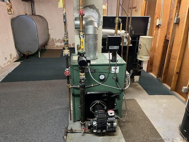 117 Lyons Rd, Bristol, CT 06010 - utilities featuring oil tank and a heating unit
