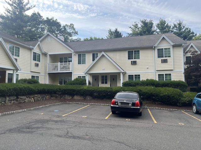 2955 Madison Ave Apt 40, Bridgeport, CT 06606 - view of building exterior with uncovered parking