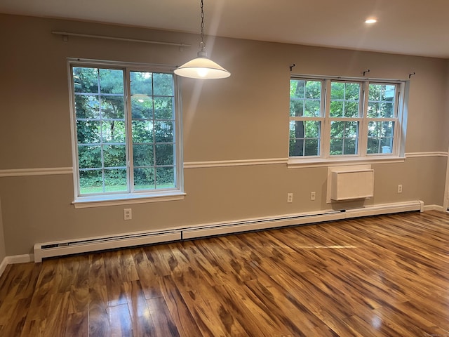 2955 Madison Ave Apt 40, Bridgeport, CT 06606 - spare room featuring plenty of natural light, baseboard heating, wood finished floors, and recessed lighting