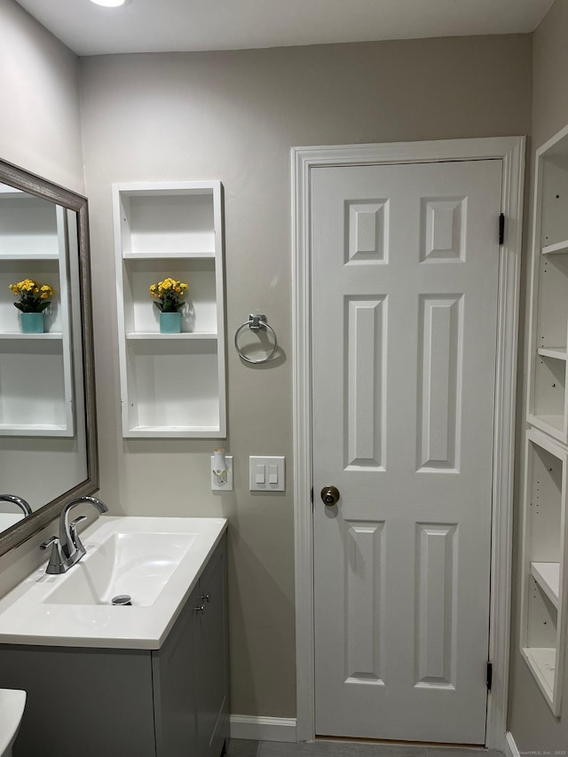 2955 Madison Ave Apt 40, Bridgeport, CT 06606 - bathroom with vanity and built in shelves