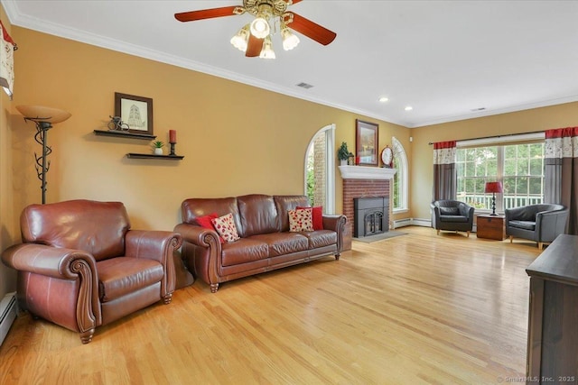 2 Kimberly Way, Marlborough, CT 06447 - living area featuring wood finished floors, a ceiling fan, a fireplace, ornamental molding, and recessed lighting