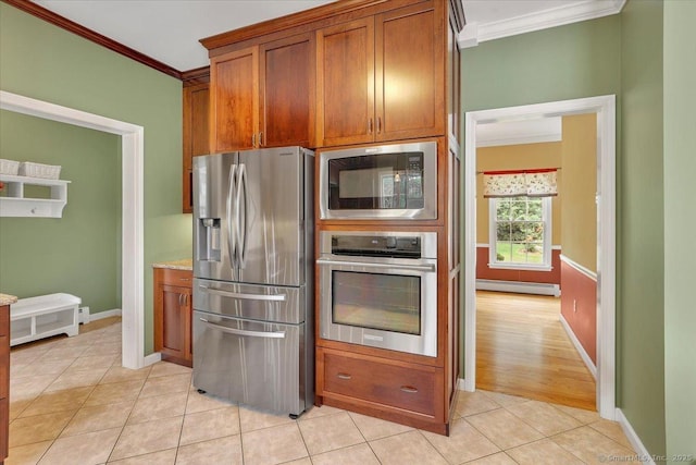 2 Kimberly Way, Marlborough, CT 06447 - kitchen featuring appliances with stainless steel finishes, ornamental molding, a baseboard radiator, brown cabinetry, and light tile patterned flooring