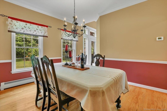 2 Kimberly Way, Marlborough, CT 06447 - dining room featuring a chandelier, baseboard heating, wood finished floors, and ornamental molding