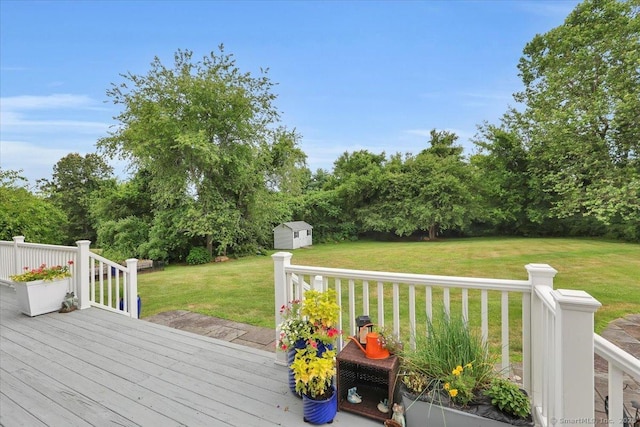 2 Kimberly Way, Marlborough, CT 06447 - wooden deck featuring a storage unit, a lawn, and view of scattered trees