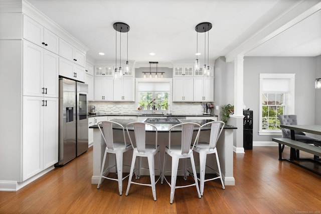 14 Finn Ln, Plainfield, CT 06374 - kitchen with stainless steel appliances, glass insert cabinets, dark wood-style flooring, decorative backsplash, and recessed lighting
