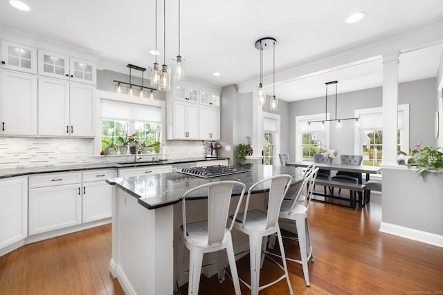 14 Finn Ln, Plainfield, CT 06374 - kitchen featuring a center island, backsplash, wood finished floors, healthy amount of natural light, and recessed lighting