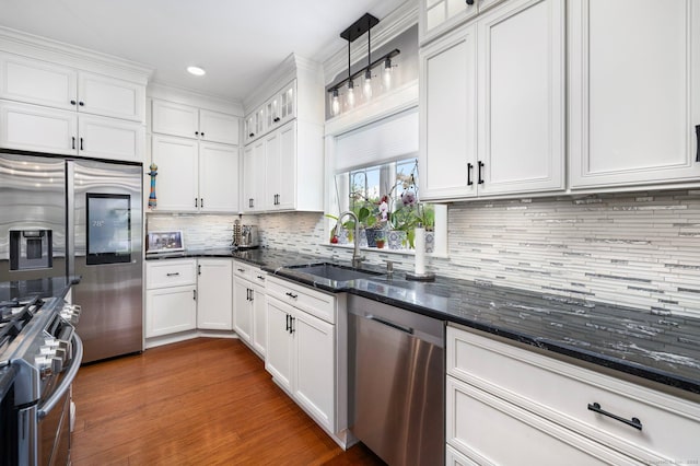 14 Finn Ln, Plainfield, CT 06374 - kitchen with stainless steel appliances, white cabinets, dark stone countertops, tasteful backsplash, and recessed lighting