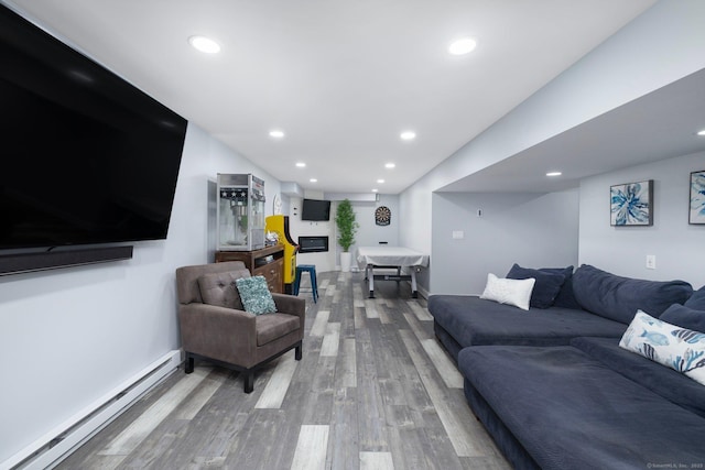 14 Finn Ln, Plainfield, CT 06374 - living area with baseboard heating, wood finished floors, and recessed lighting