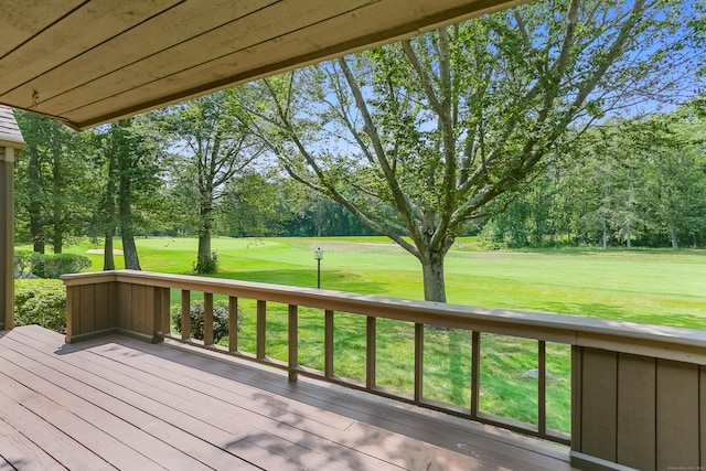 194 Bayfield Ln Unit A, Stratford, CT 06614 - wooden deck featuring a yard and view of wooded area