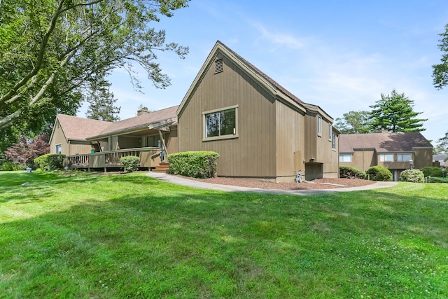 194 Bayfield Ln Unit A, Stratford, CT 06614 - back of house featuring a wooden deck and a yard