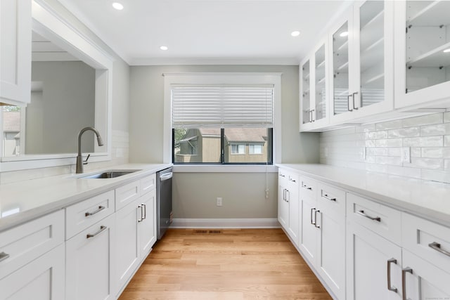 194 Bayfield Ln Unit A, Stratford, CT 06614 - kitchen featuring light wood-style floors, plenty of natural light, white cabinets, recessed lighting, and ornamental molding