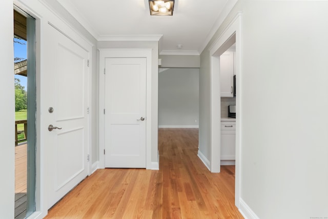 194 Bayfield Ln Unit A, Stratford, CT 06614 - corridor with light wood finished floors and ornamental molding
