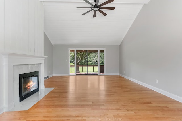 194 Bayfield Ln Unit A, Stratford, CT 06614 - unfurnished living room with ceiling fan, light wood finished floors, a fireplace, and vaulted ceiling