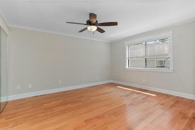 194 Bayfield Ln Unit A, Stratford, CT 06614 - spare room with light wood finished floors, ceiling fan, and crown molding