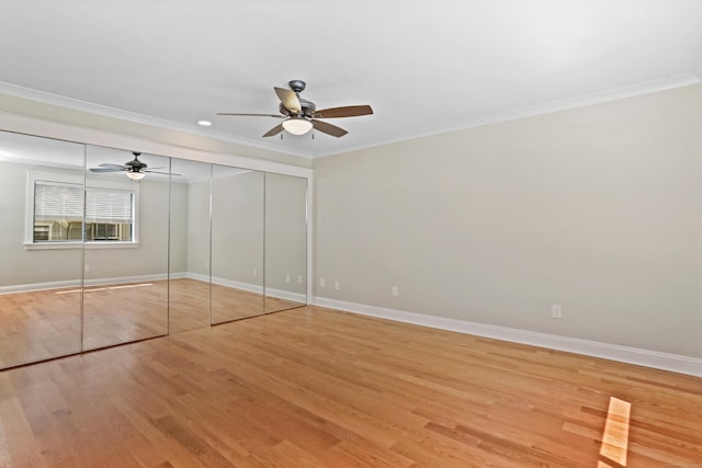 194 Bayfield Ln Unit A, Stratford, CT 06614 - unfurnished bedroom with ornamental molding, light wood-type flooring, a closet, and ceiling fan