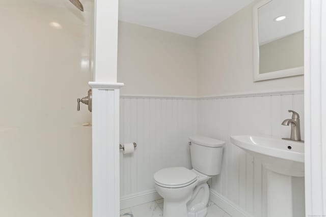 194 Bayfield Ln Unit A, Stratford, CT 06614 - bathroom featuring marble finish flooring and wainscoting
