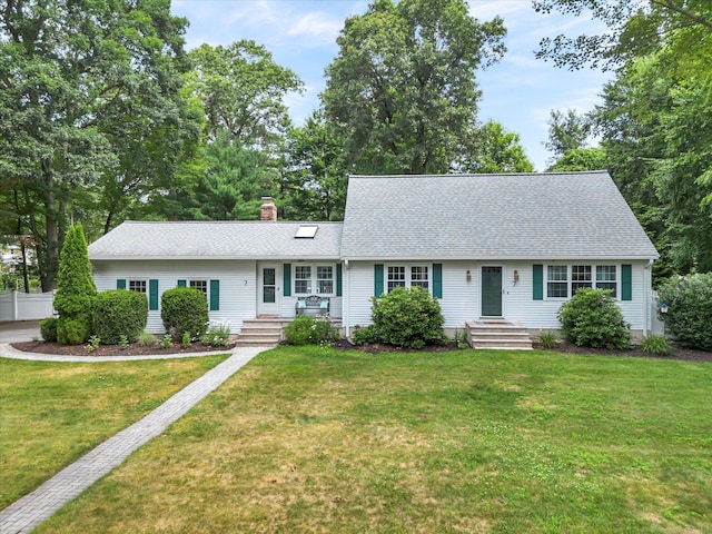 7 Lorraine Rd, Manchester, CT 06040 - view of front of house with a front yard, a chimney, and roof with shingles