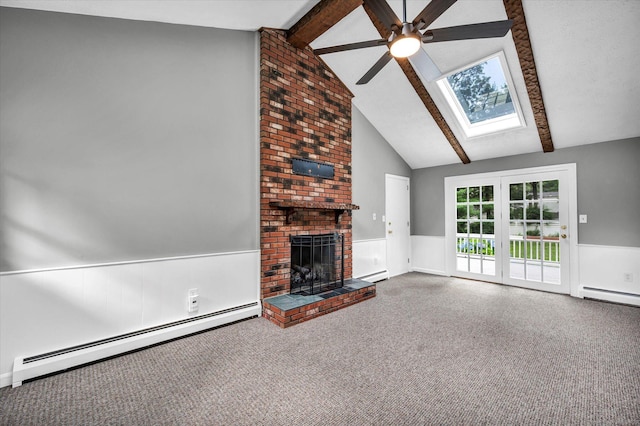 7 Lorraine Rd, Manchester, CT 06040 - unfurnished living room with a baseboard heating unit, a ceiling fan, a skylight, wainscoting, and carpet flooring