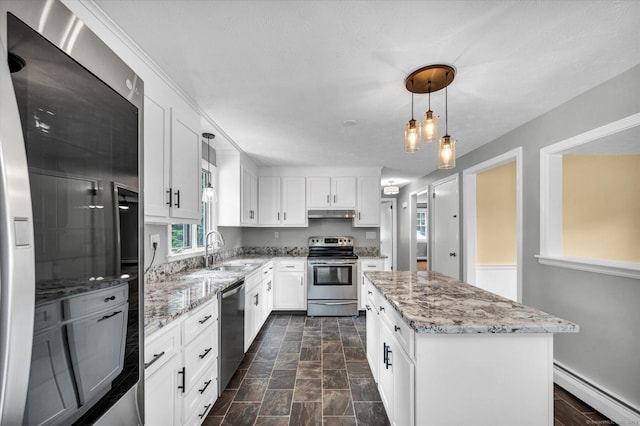 7 Lorraine Rd, Manchester, CT 06040 - kitchen featuring appliances with stainless steel finishes, baseboard heating, a kitchen island, light stone counters, and white cabinets