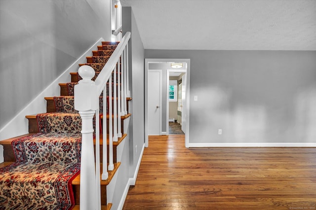 7 Lorraine Rd, Manchester, CT 06040 - stairs with wood finished floors and baseboards