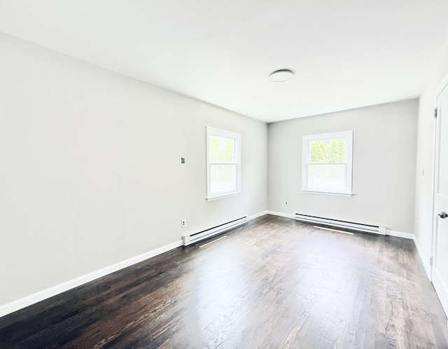 10 Meadowpark Ave W, Stamford, CT 06905 - empty room with a baseboard radiator and dark wood-type flooring