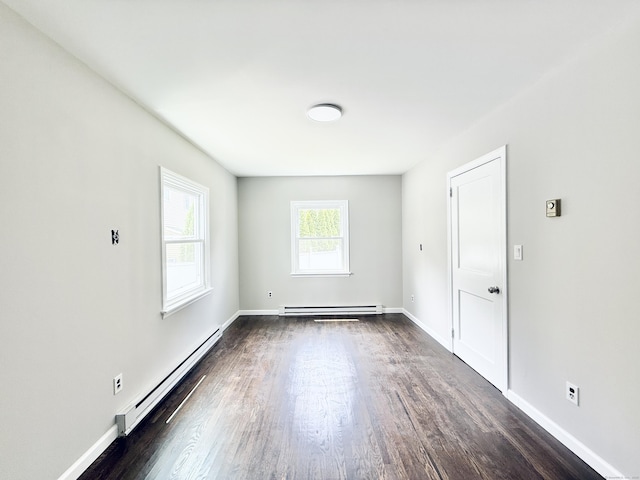 10 Meadowpark Ave W, Stamford, CT 06905 - unfurnished room with a baseboard radiator and dark wood-type flooring