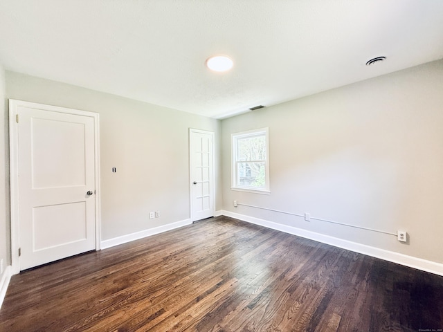 10 Meadowpark Ave W, Stamford, CT 06905 - empty room featuring dark wood finished floors